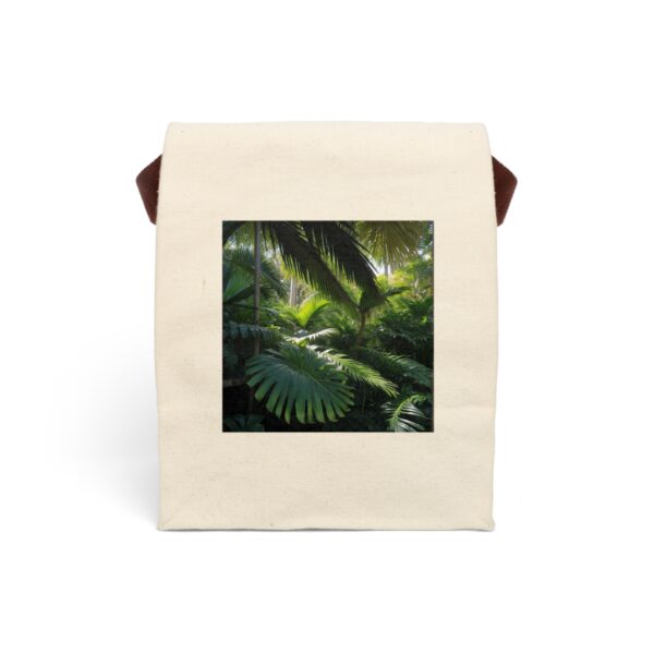 Canvas lunch bag with strap featuring a dense tropical foliage design