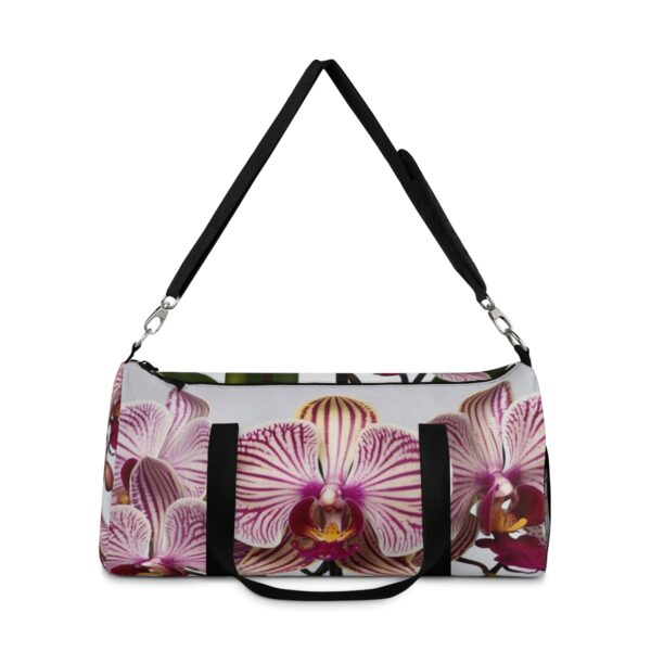 duffel bag with striped orchid flower design and detachable shoulder strap