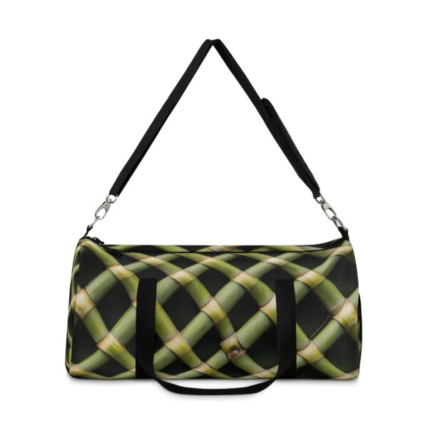 duffel bag with crisscross bamboo stalk pattern and detachable shoulder strap