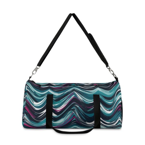 Duffel bag with colorful zigzag wave pattern and adjustable shoulder strap