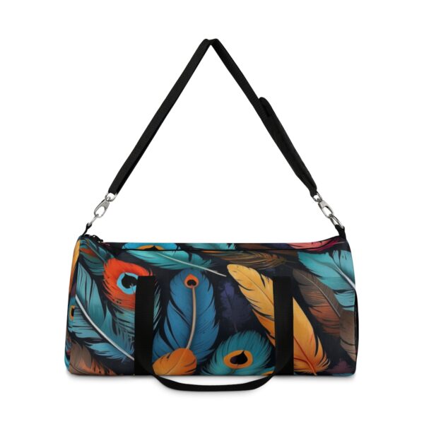 duffel bag with vibrant peacock and exotic bird feather design and detachable shoulder strap