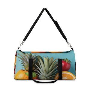 duffel bag with colorful tropical fruit design including pineapple, oranges, and strawberries and detachable shoulder strap