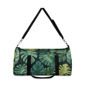 Duffel bag with lush green tropical leaf pattern and detachable shoulder strap