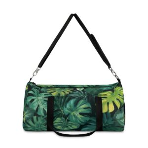 Duffel bag with green tropical leaf pattern and detachable shoulder strap