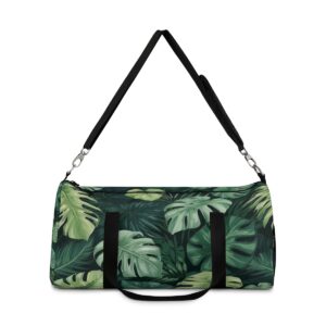 Duffel bag with vibrant tropical leaf pattern and detachable shoulder strap