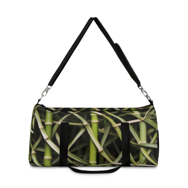 duffel bag with green bamboo stalk design and detachable shoulder strap