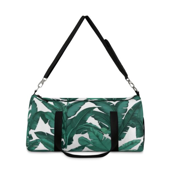 duffel bag with green banana leaf print and detachable shoulder strap