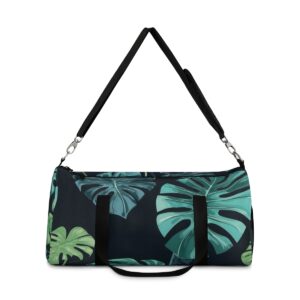 Duffel bag with dark Monstera leaf pattern and detachable shoulder strap