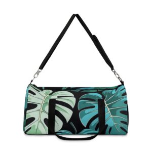 Duffel bag with contrasting Monstera leaf design and detachable shoulder strap