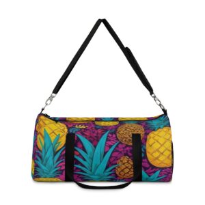 Duffel bag with vibrant pineapple and tropical leaf pattern and detachable shoulder strap