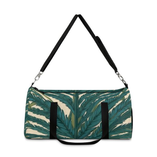 duffel bag with bold palm frond pattern and detachable shoulder strap