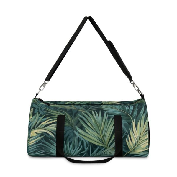 duffel bag with green palm frond pattern and detachable shoulder strap