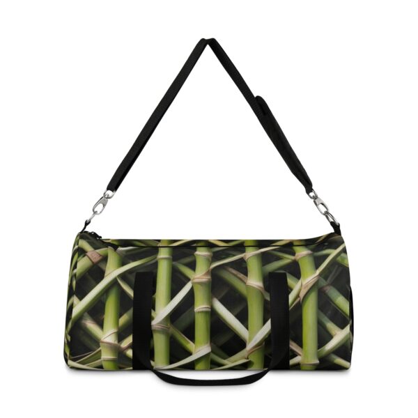 duffel bag with green bamboo stalk design and detachable shoulder strap