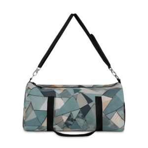 Duffel bag with fragmented geometric shapes and adjustable shoulder strap