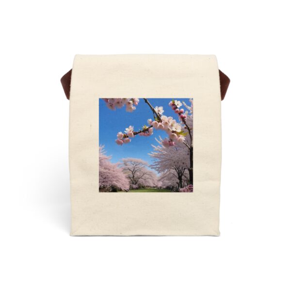 Canvas lunch bag with strap featuring cherry blossoms in full bloom against a bright blue sky