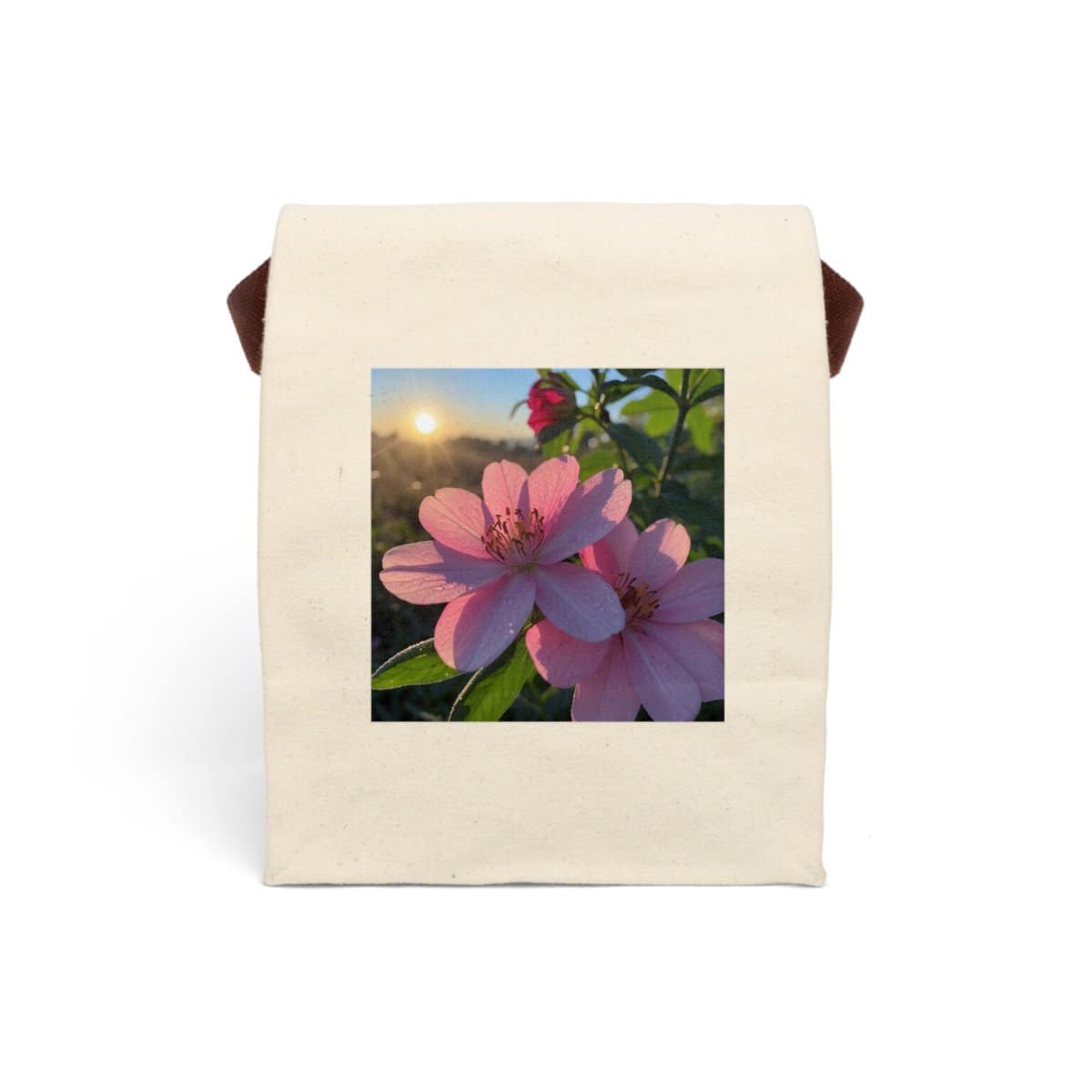 Canvas lunch bag with strap featuring a close-up of pink flowers with a sunrise background