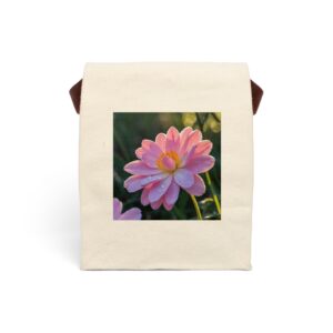 Canvas lunch bag with strap featuring a close-up of a pink flower with morning dew