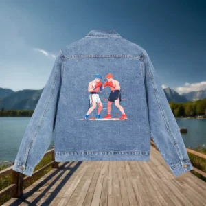 Flat view of a denim jacket with an anime-style graphic of two boxers in a face-off pose, one in red and the other in blue.