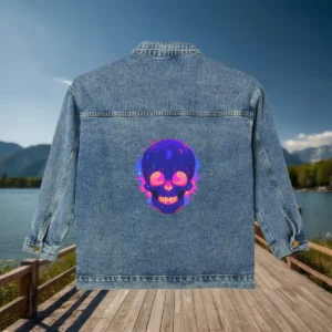 Flat view of a denim jacket with a colorful neon skull design in pop art style on the back.