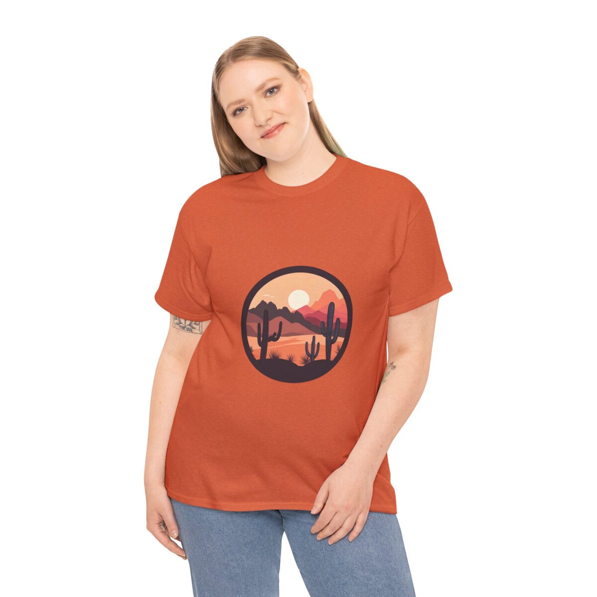 Woman wearing an Arizona T-Shirt with a sunset and desert-inspired cactus design.