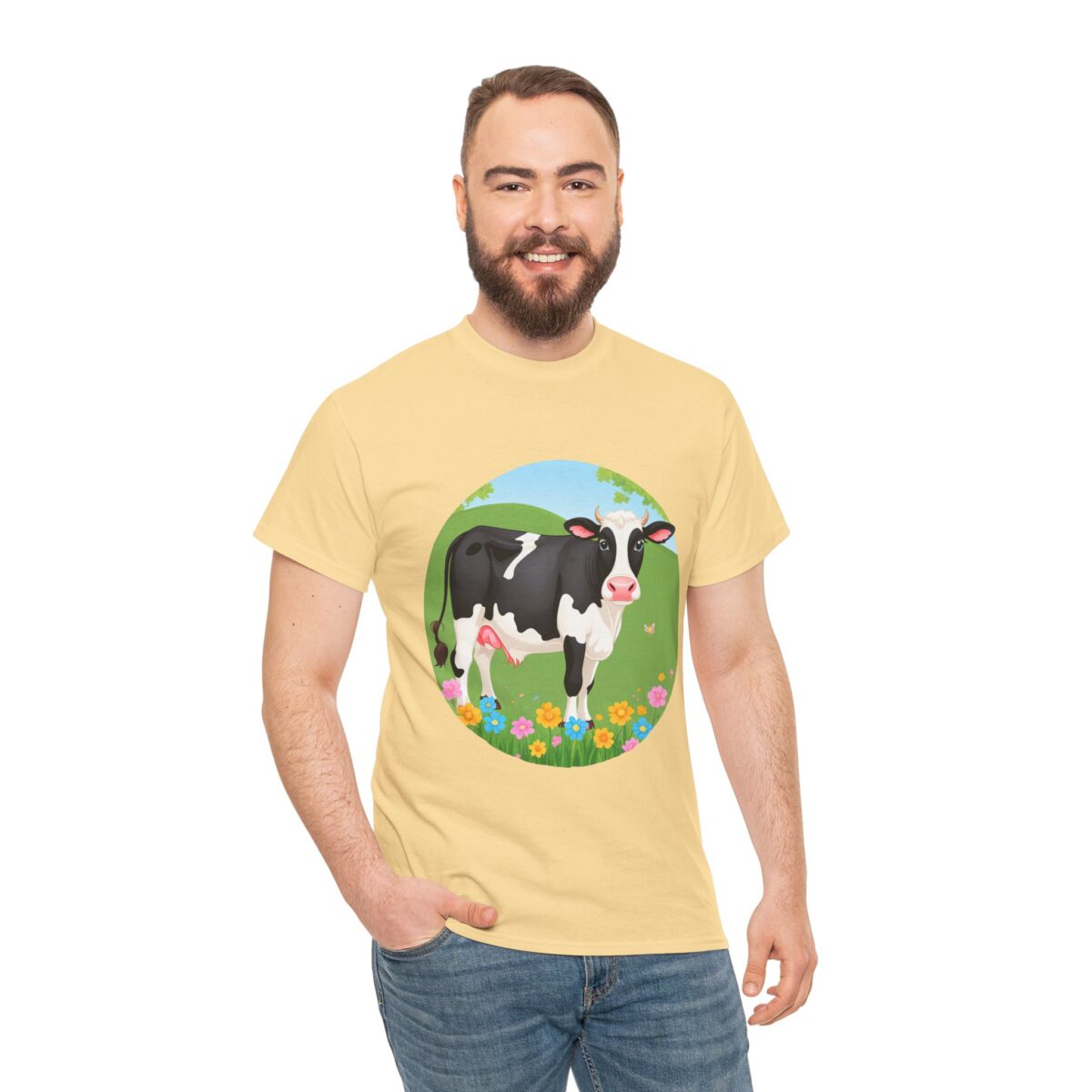 Man wearing a Cow T-Shirt with a countryside illustration