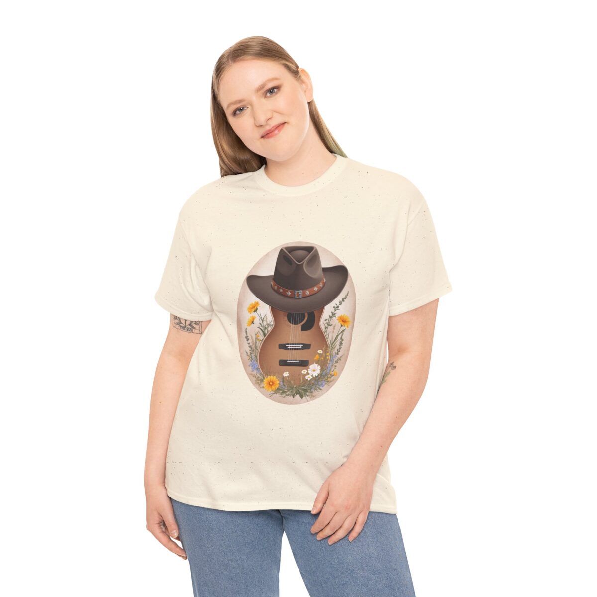 Woman wearing a Country Music T Shirt featuring a guitar and cowboy hat design.