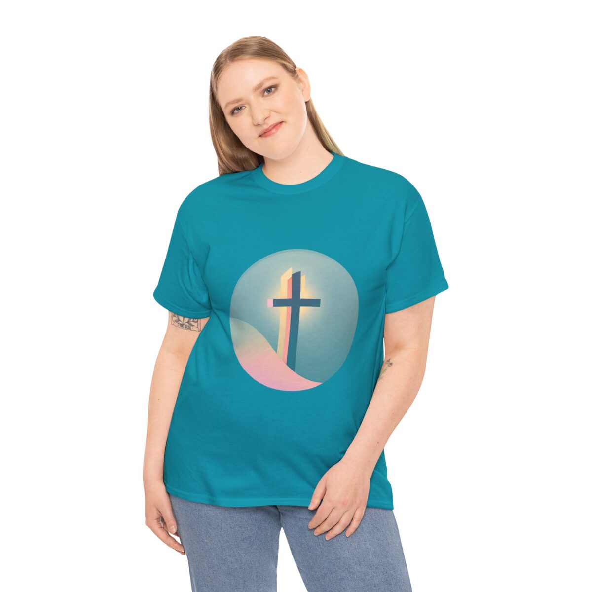 Woman wearing a Funny Christian T Shirt with a cross design and colorful background.