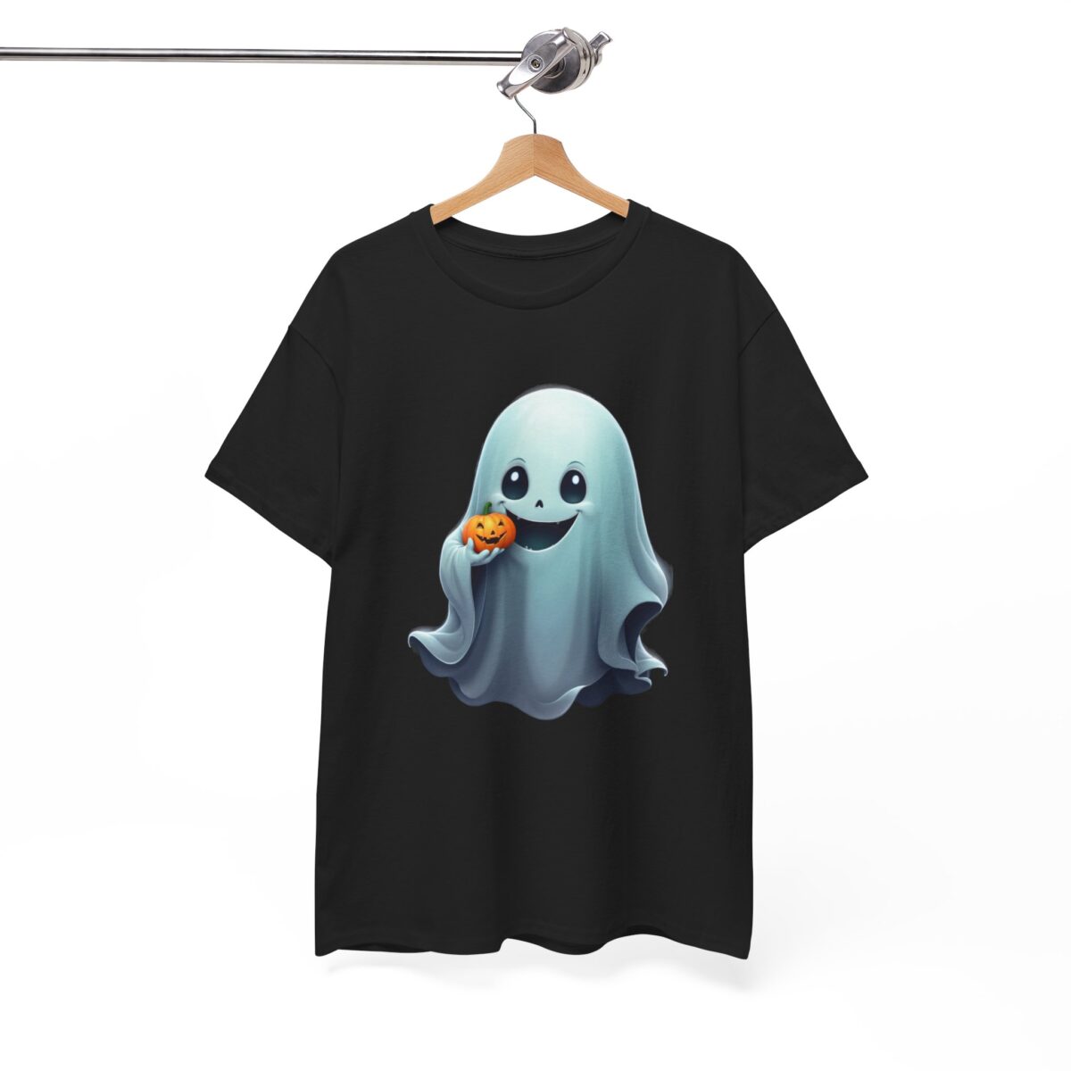 Ghost T Shirt displayed on a hanger, featuring a cute ghost holding a pumpkin on black fabric