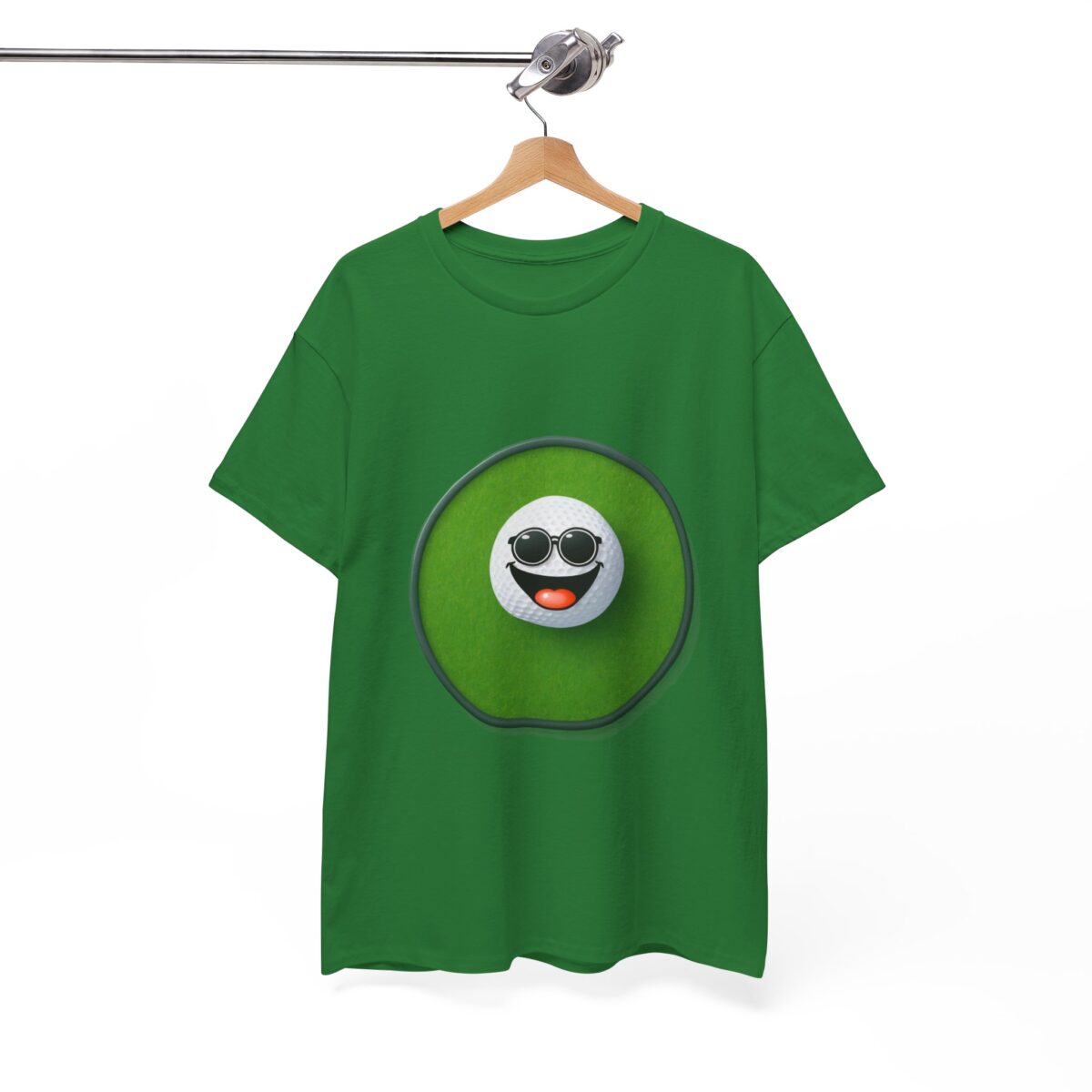 Green Golf T Shirt with a smiling golf ball design hanging on a hanger.