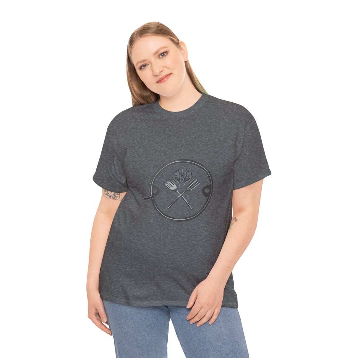 A woman wearing a comfortable Bbq T Shirt​ with a minimalist barbecue design.