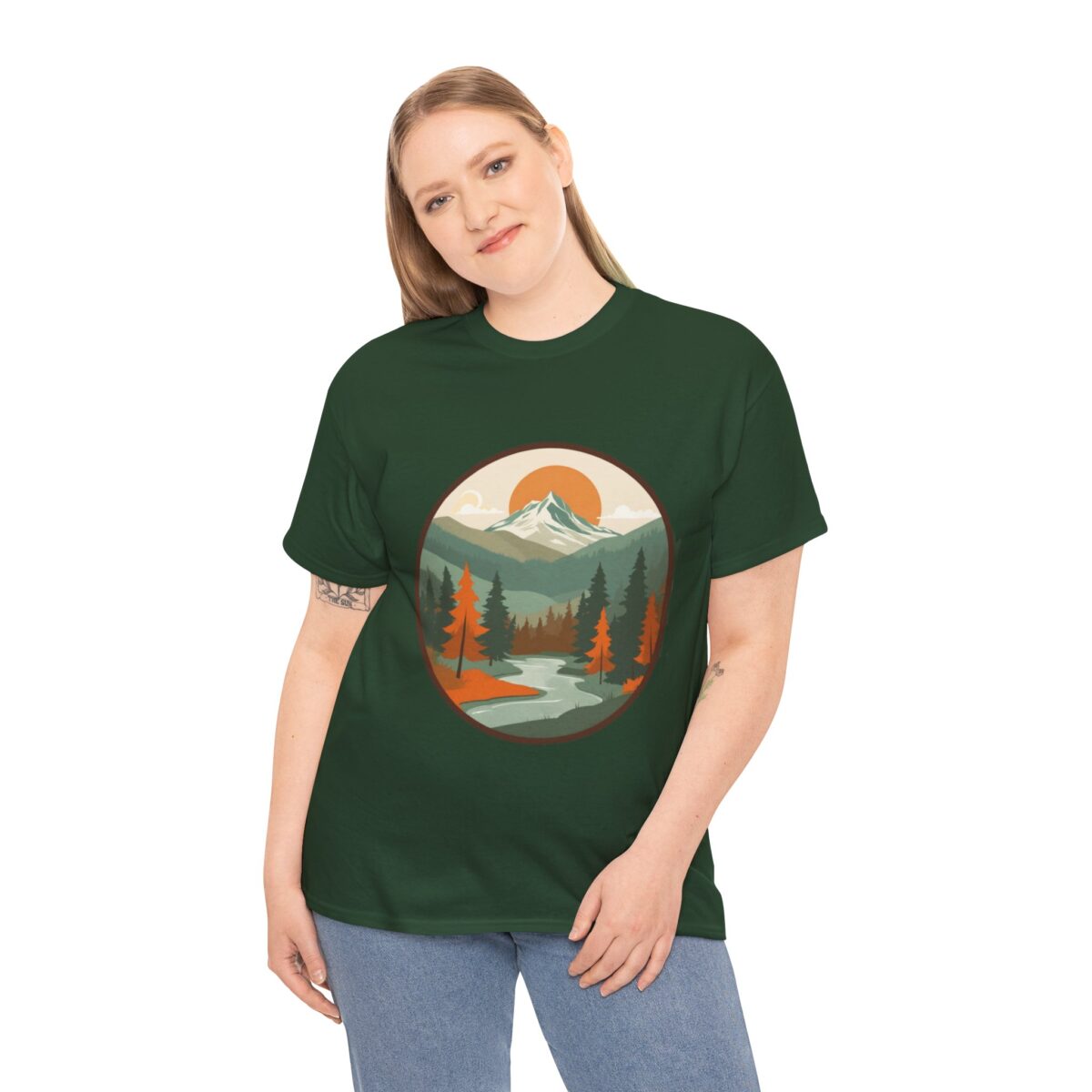 Woman wearing a National Park T Shirt with a scenic forest and mountain design.