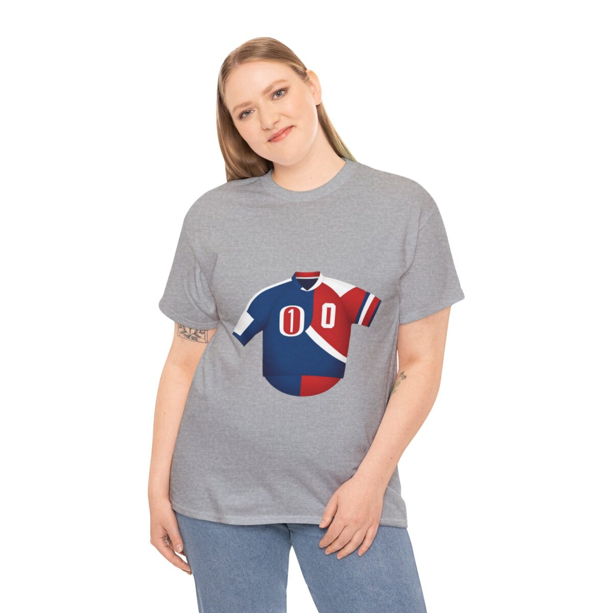 Woman wearing a gray t-shirt with a bold jersey-style graphic design in red, blue, and white.