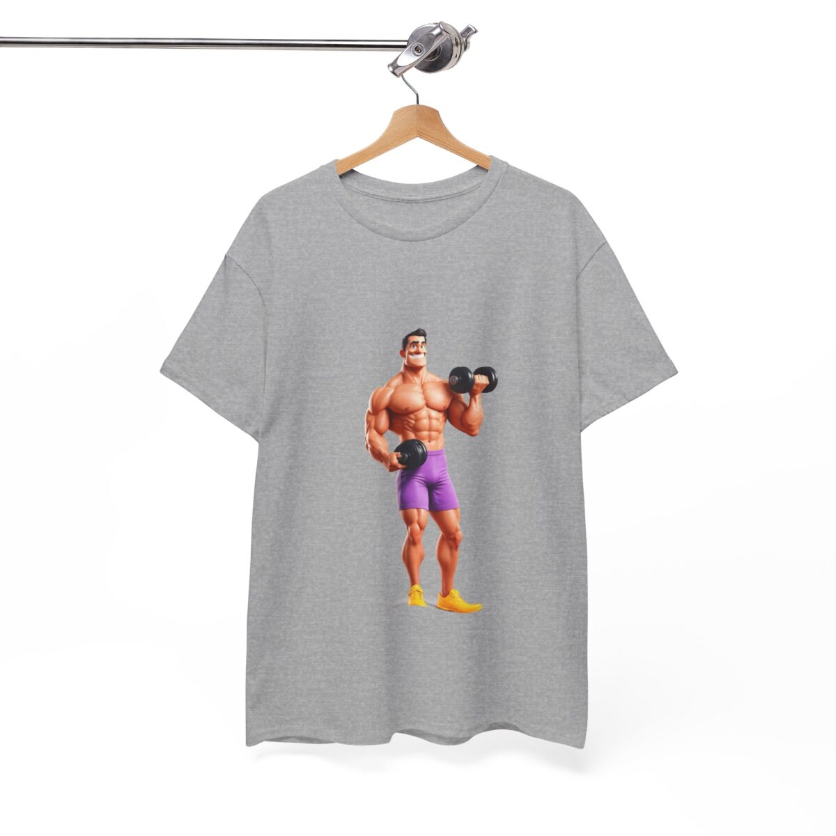 Funny Gym T Shirts​ hanging on a wooden hanger, featuring a muscle-bound character with dumbbells.