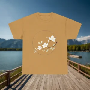 Brown t-shirt with magnolia branch graphic laid flat