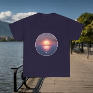 I survived skin cancer t shirt featuring a navy blue t-shirt with a serene sunset over the ocean design in a circular frame