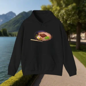 Black hoodie with colorful ramen bowl and chopsticks graphic laid flat