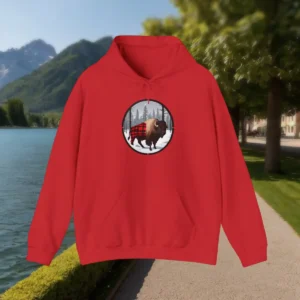 Red hoodie with a buffalo in plaid graphic, displayed outdoors near a mountain lake.