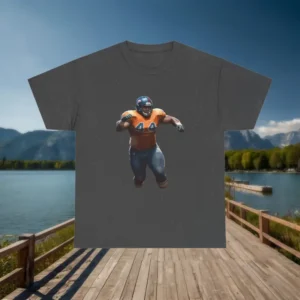 Dark grey t-shirt with offensive lineman football player graphic, displayed flat on wooden boardwalk