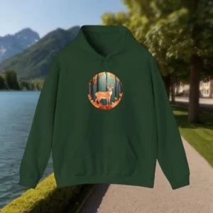 Green hoodie with stylized deer in fall forest with orange leaves