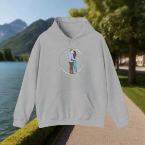 Grey hoodie with drawing of romantic couple hugging inside a circular frame