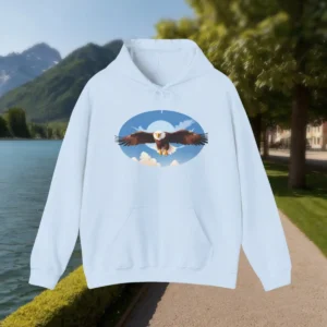 Light blue hoodie with a flying eagle and blue sky background