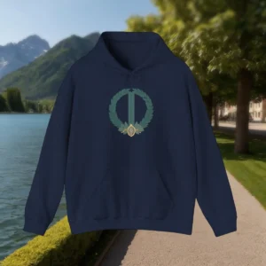 Navy blue hoodie with laurel wreath crest laid flat near a scenic lake path