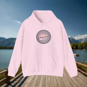 Light pink hoodie with pink camouflage chameleon design on a wooden deck