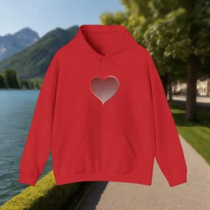 Red hoodie laid flat with centered gradient heart graphic