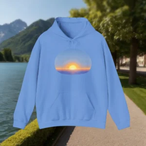 Flat view of a light blue hoodie with a sunset or sunrise ocean scene
